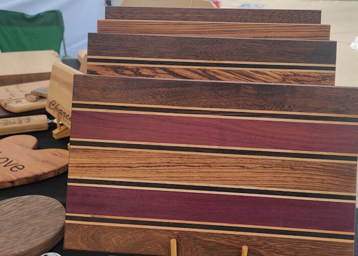 Monkeybear Creations market booth featuring handmade items